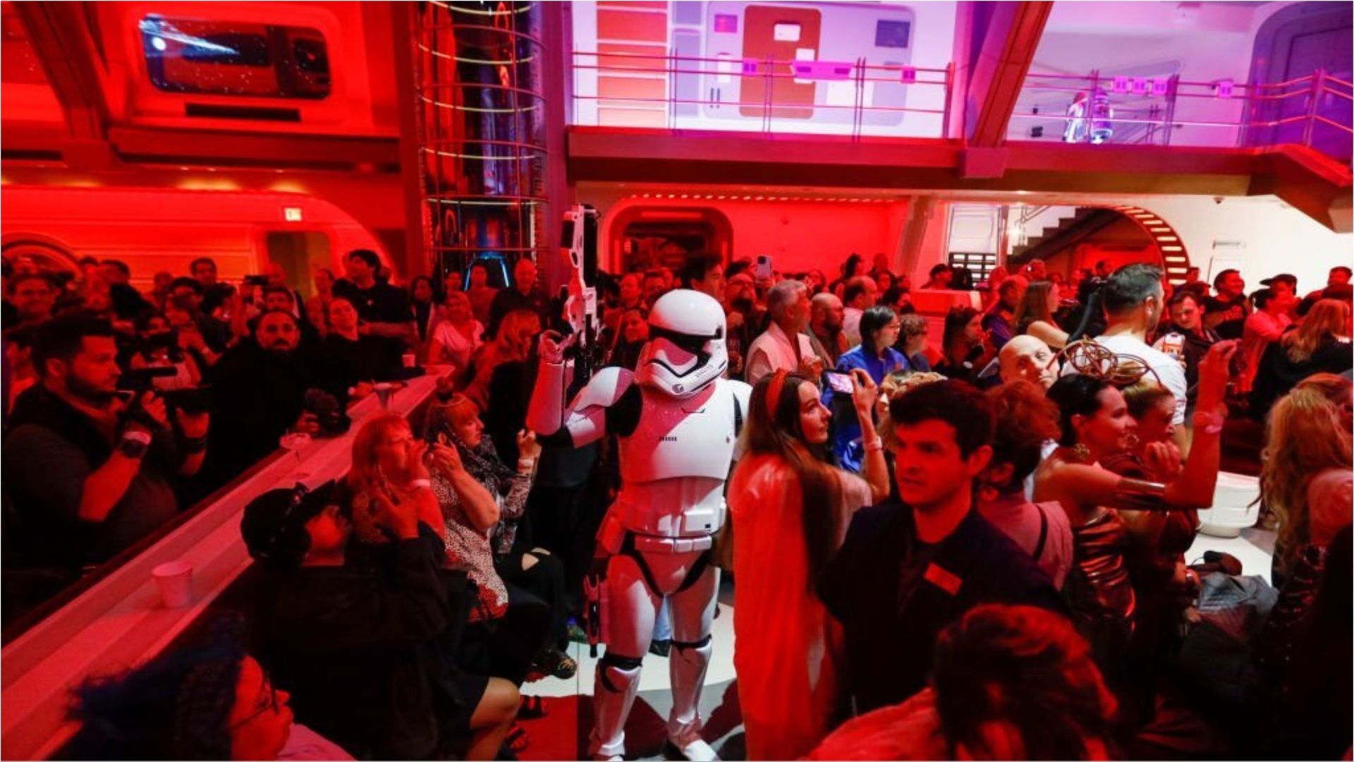 First Order Stormtroopers patrol through the crowd as the first passengers experience the hotel (Image via Allen J. Schaben/Getty Images)