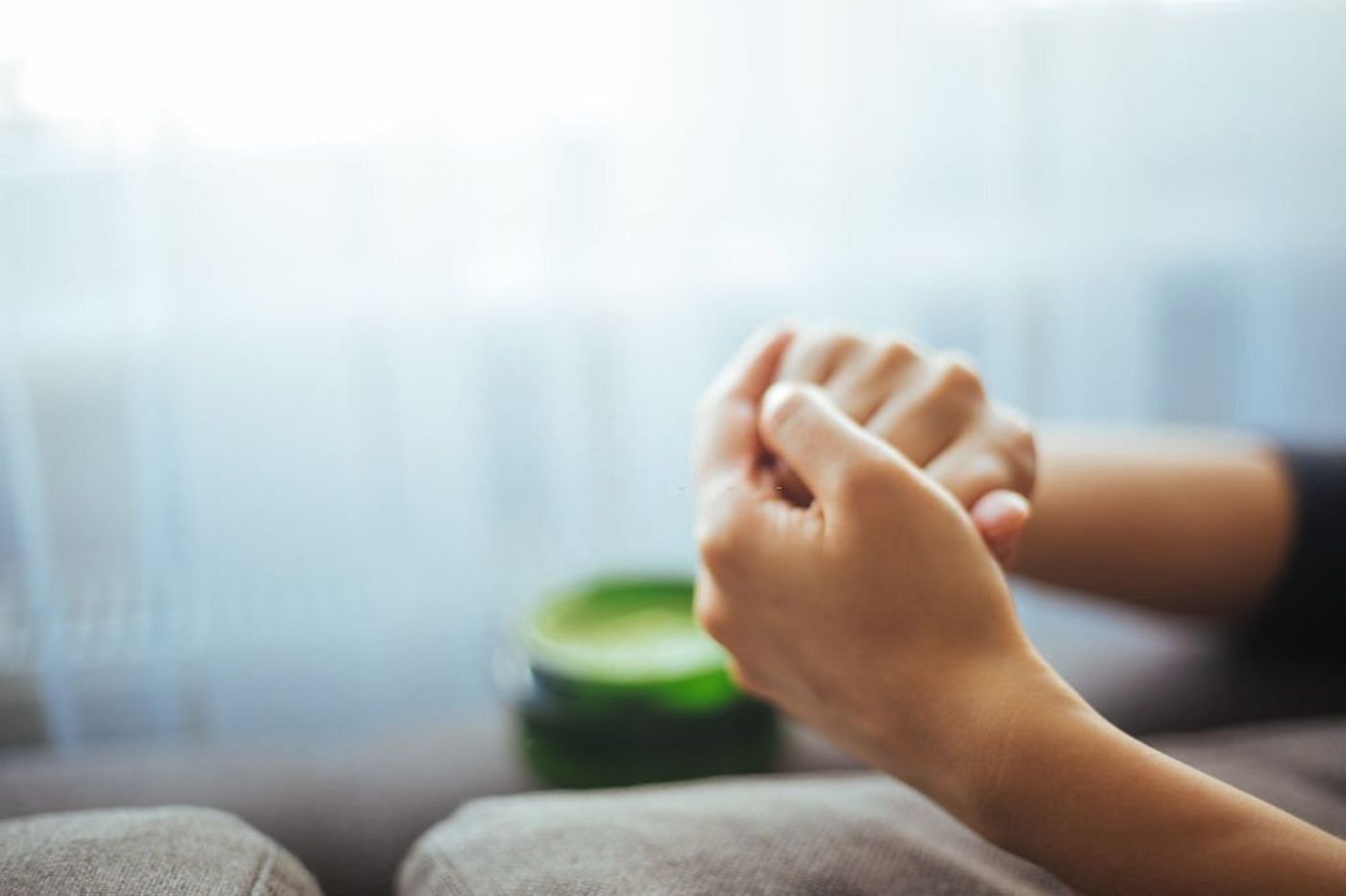 Get rid of dry and cracked hands and feet with these tips (Image via Getty)