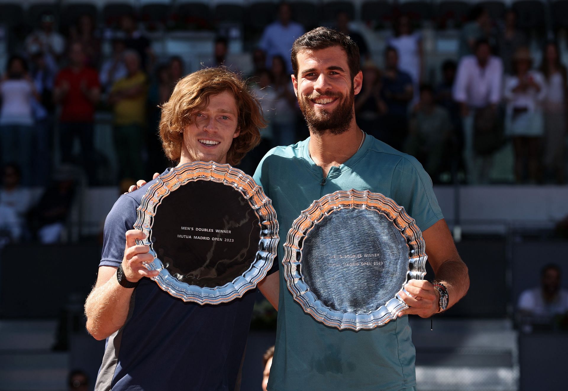 Andrey Rublev and Karen Khachanov with the men&#039;s doubles trophy at the 2023 Madrid Open