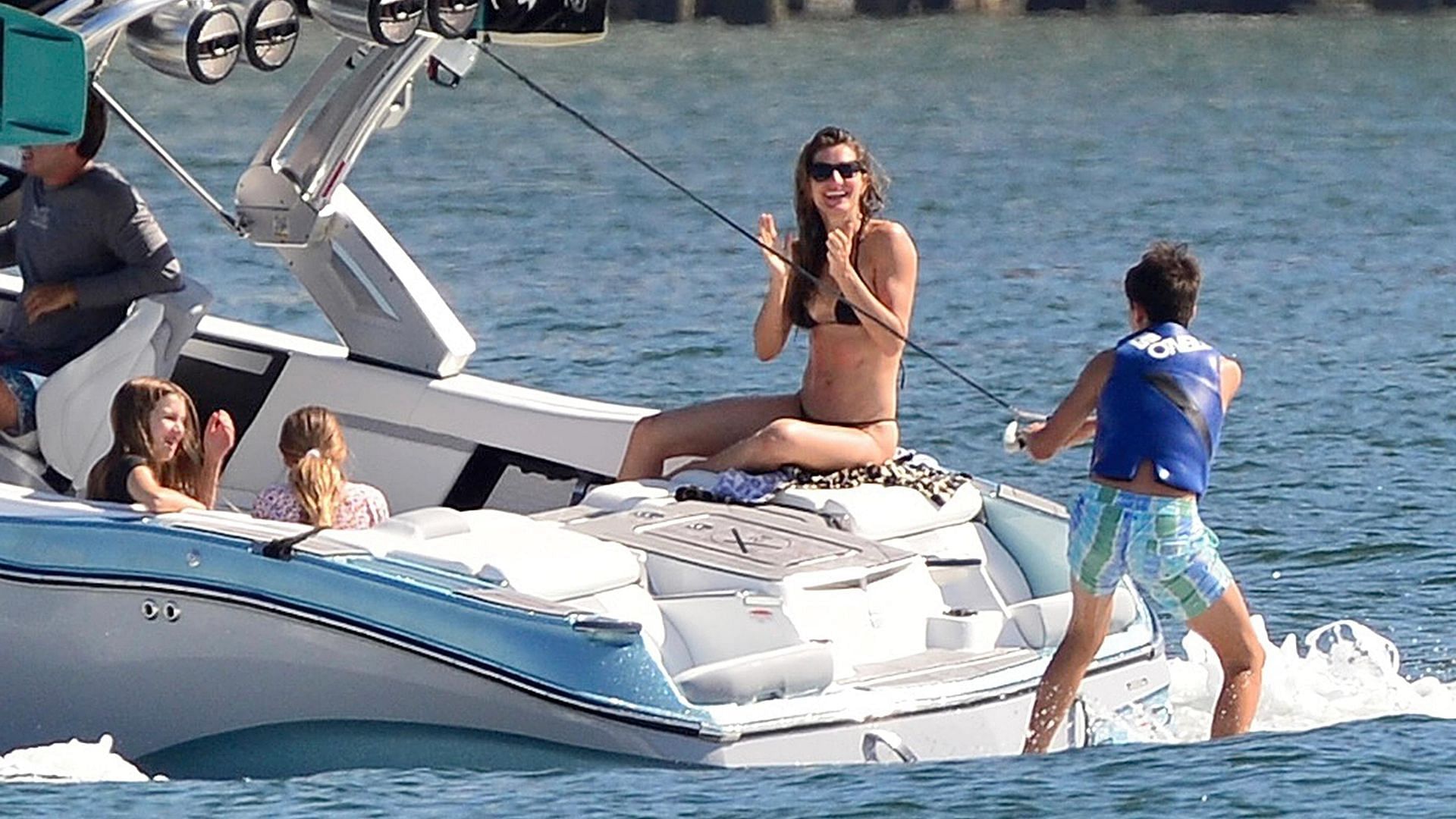 The supermodel encouraging Benjamin trying to wakeboard. Credit: Page Six