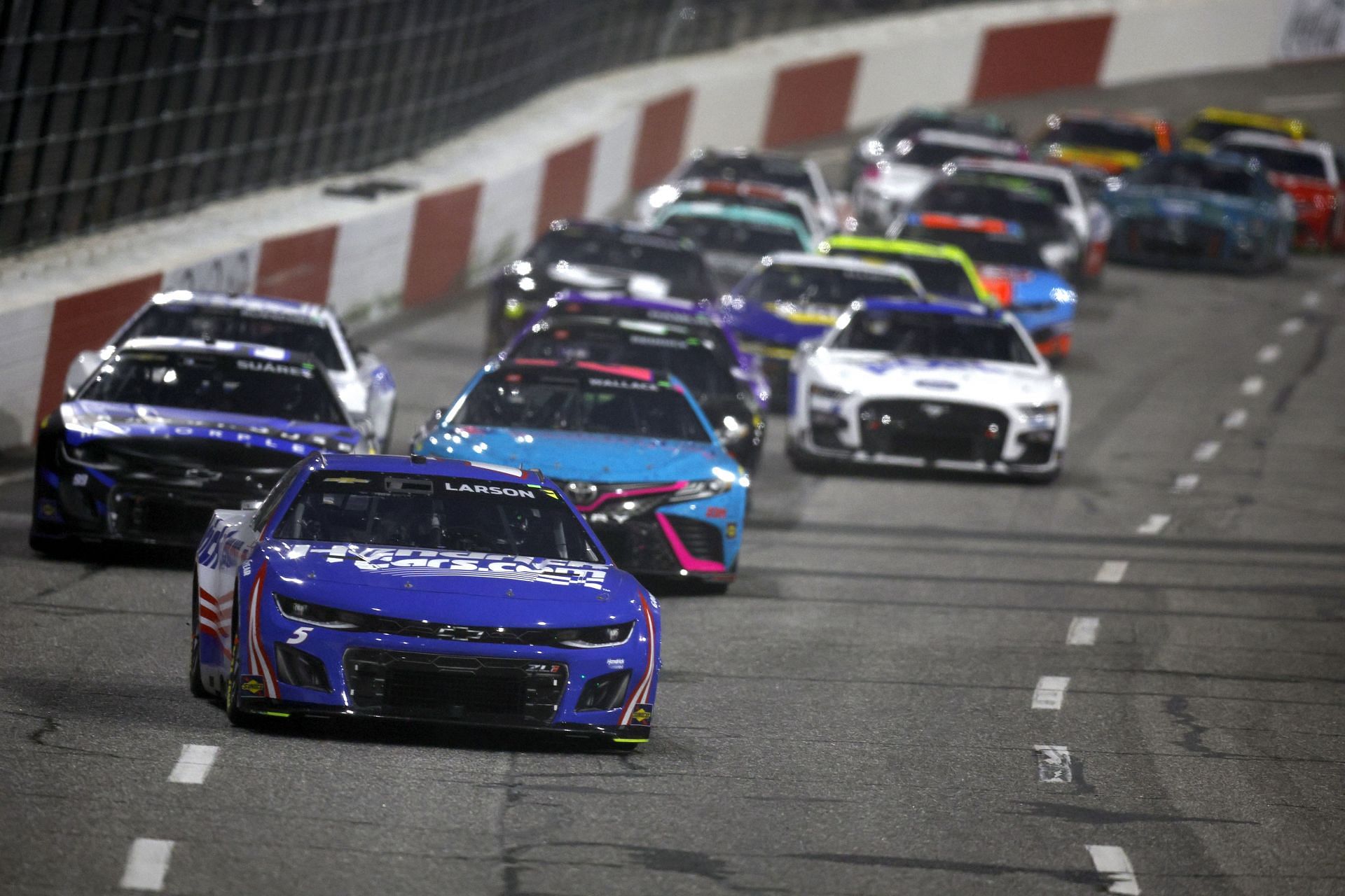 Kyle Larson leads the field in the All-Star Race