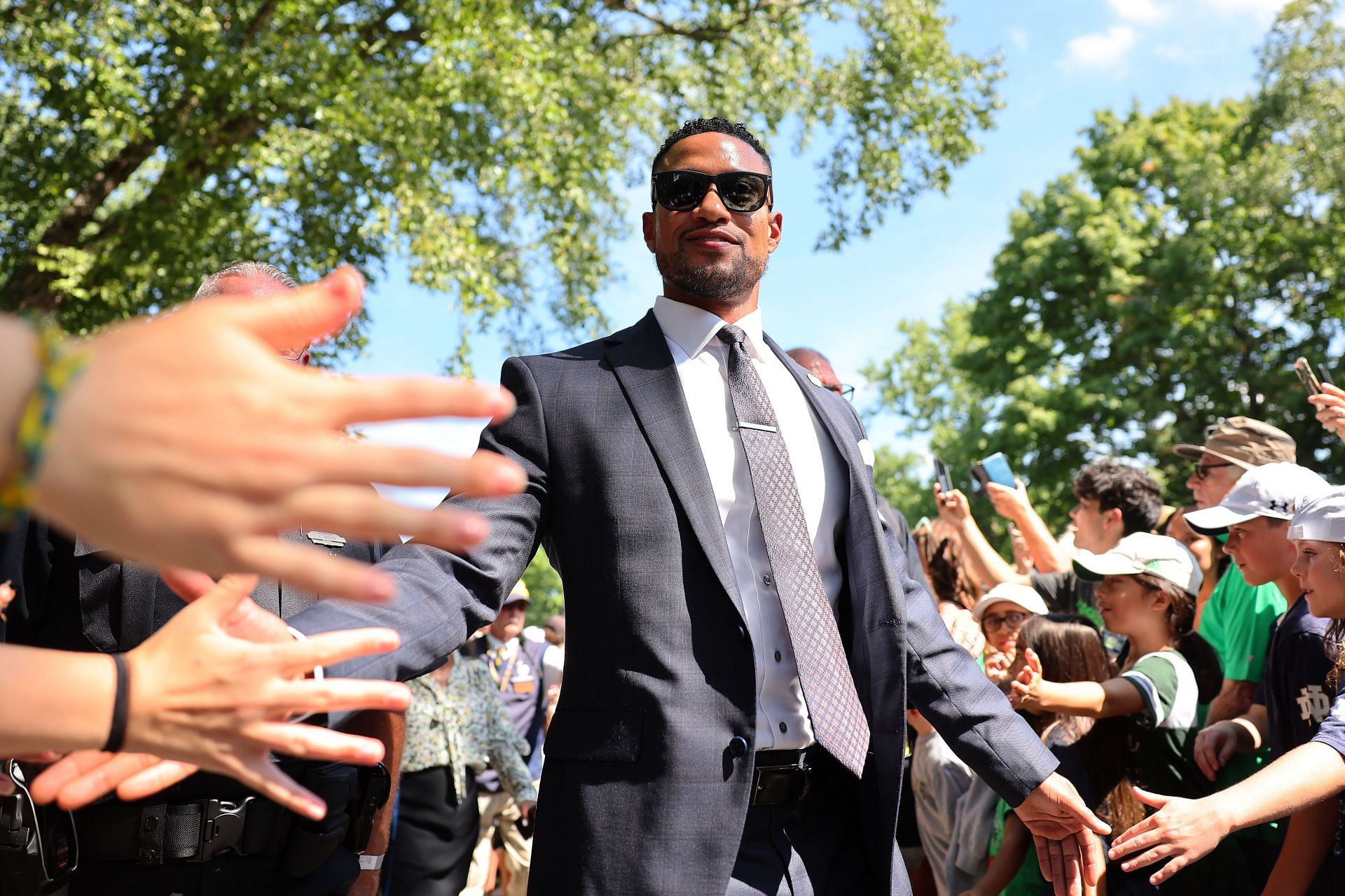 Marcus Freeman meets fans before a game.