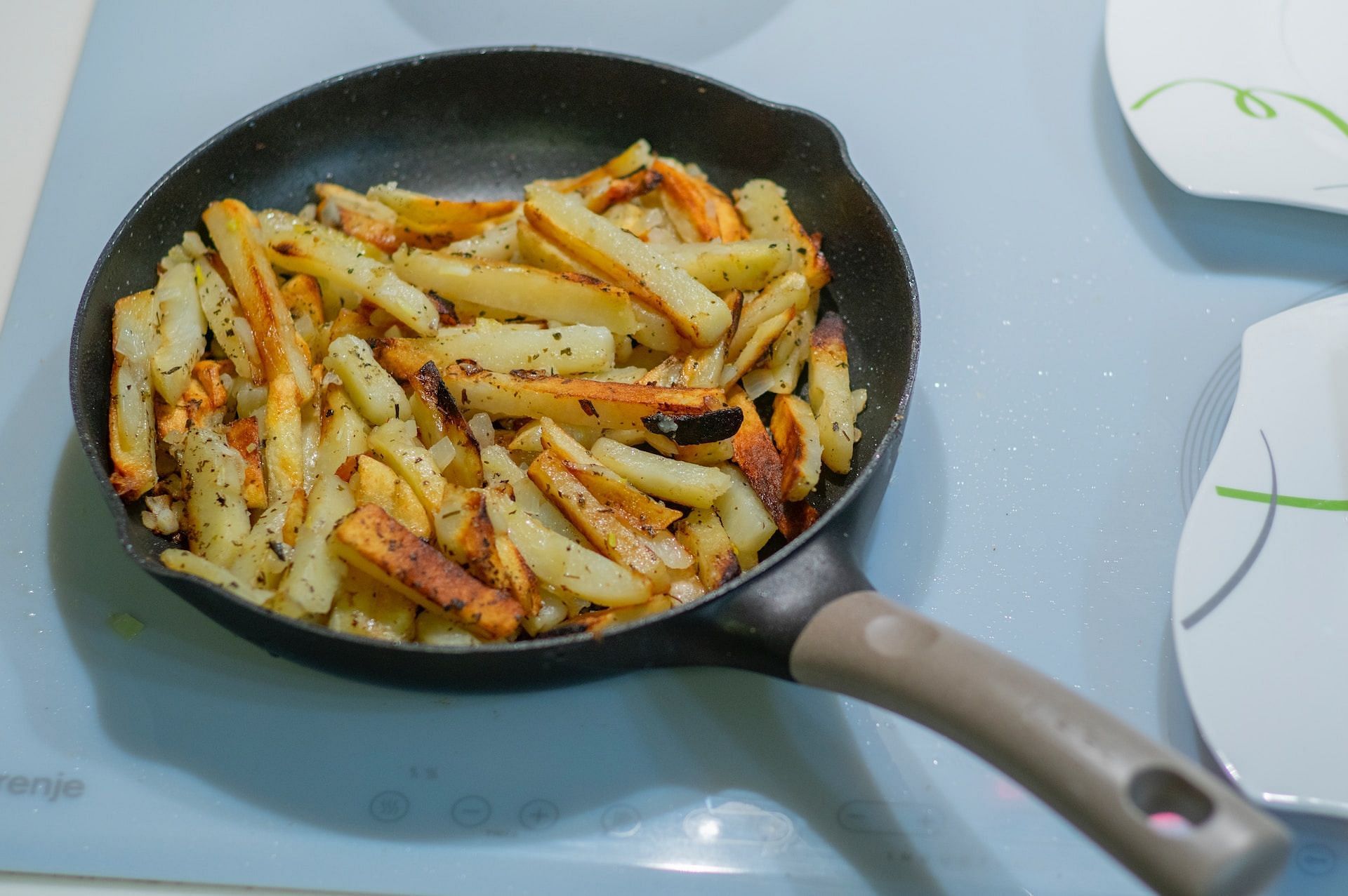 Fries (Photo by Elena Mozhvilo on Unsplash)