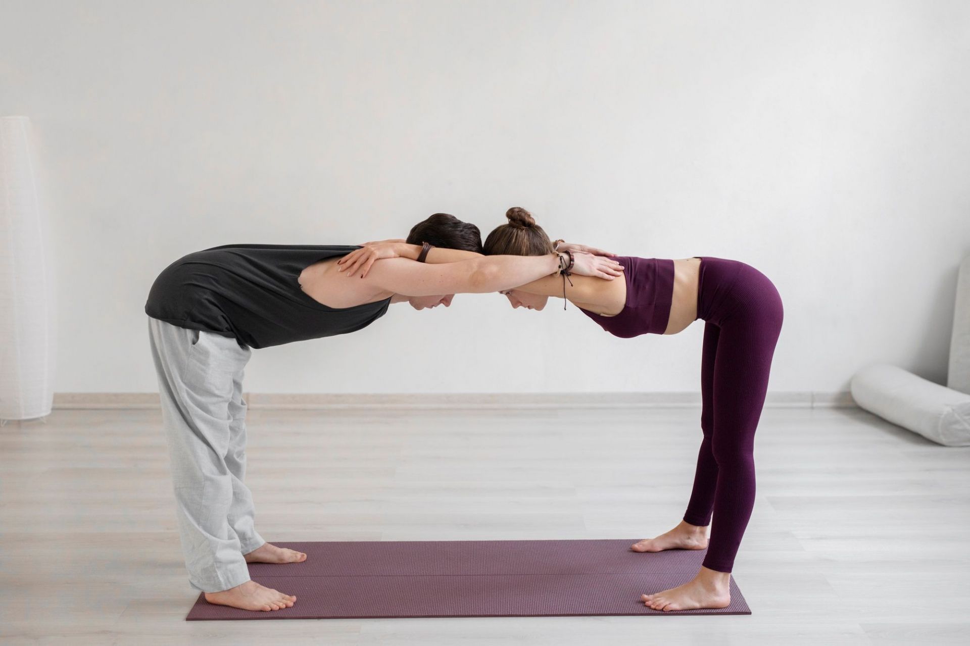 6 Couple Yoga Poses to Help You Bond With Your Partner