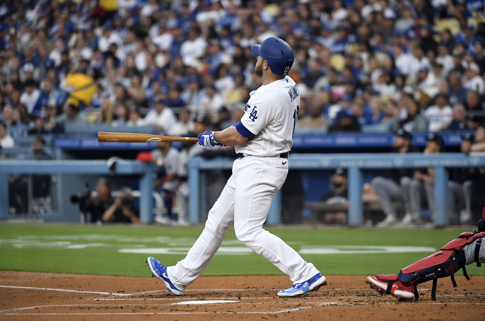 Max Muncy #13 of the Los Angeles Dodgers hits a home run