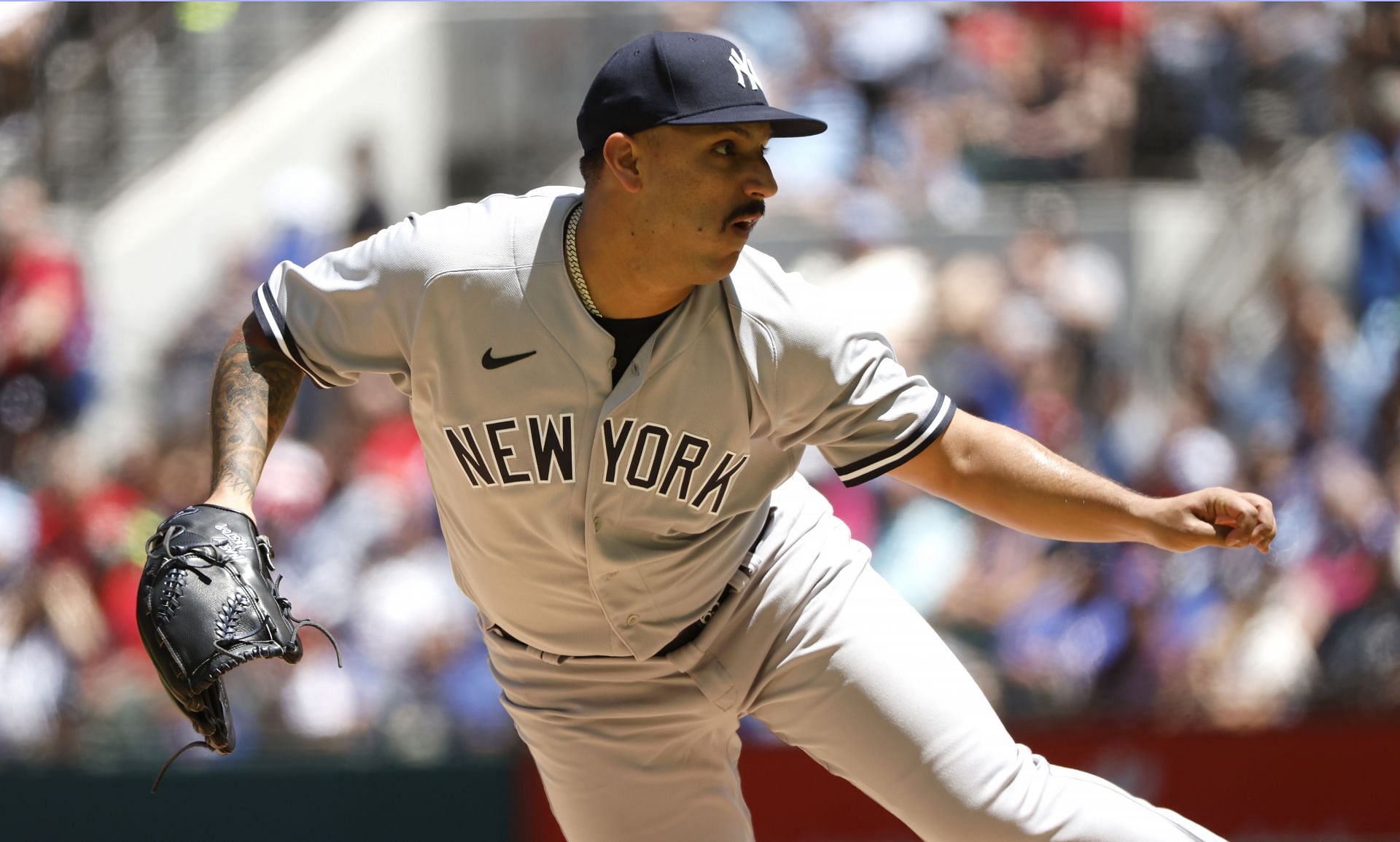 Nestor Cortes #65 of the New York Yankees delivers against the Texas Rangers