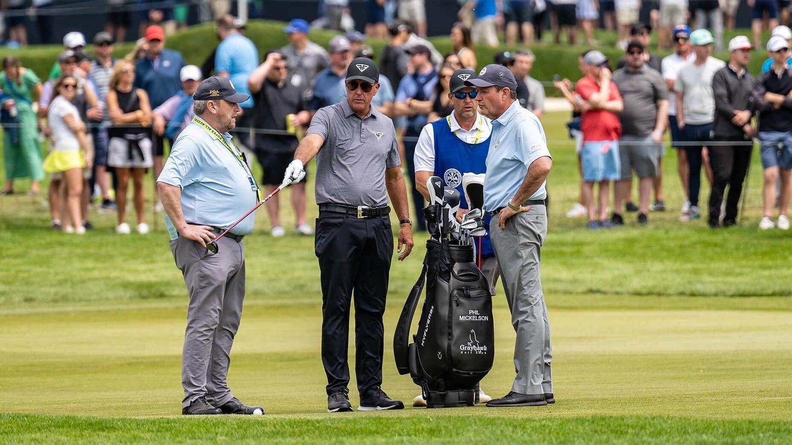 Phil Mickelson discussing the rule with the rule officers. 2023 PGA Championship, Round Two (Image via Golf.com).