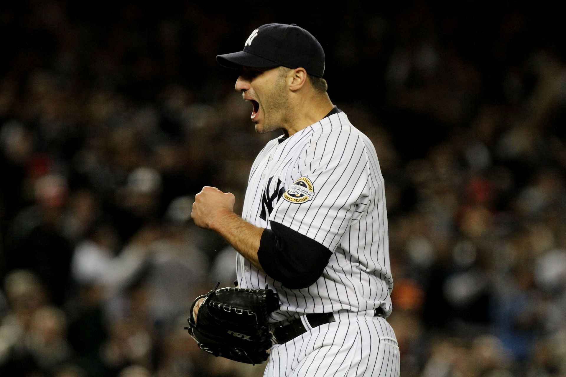 Andy Pettitte #46 of the New York Yankees celebrates the end of the top of the sixth inning of Game Six of the ALCS against the Los Angeles Angels of Anaheim during the 2009 MLB Playoffs at Yankee Stadium on October 25, 2009 in New York, New York. (Photo by Al Bello/Getty Images)