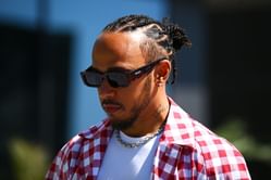 “He was made for this!”: F1 fans swoon as Lewis Hamilton is pictured alongside fashion royalty Donatella Versace and pop-star Dua Lipa