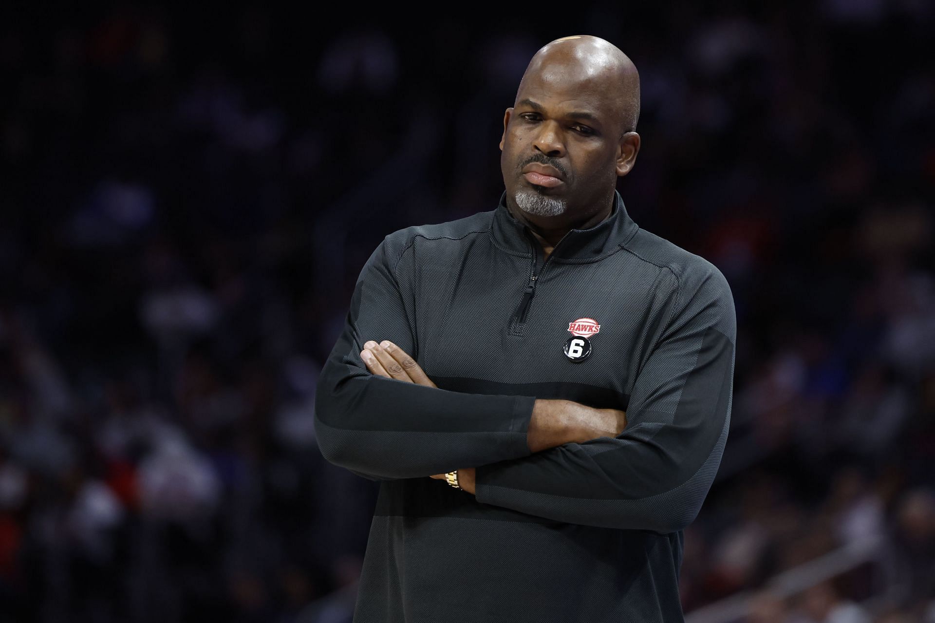 Nate McMillan looks on at a game
