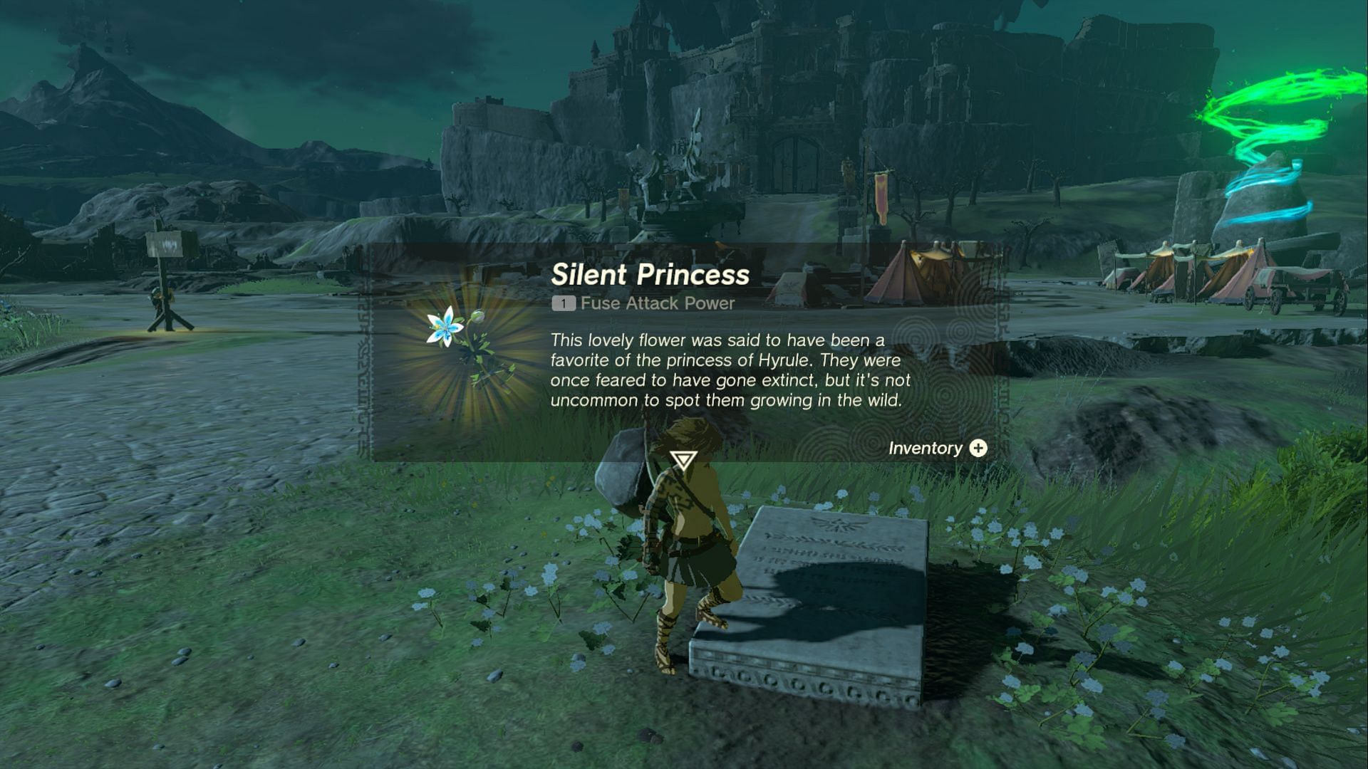 The shrine is near this memorial and a bunch of tents (Screenshot via The Legend of Zelda Tears of The Kingdom)