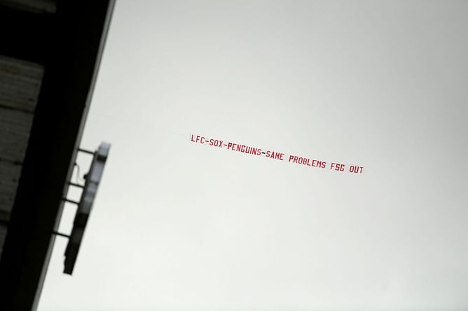 WATCH: Pittsburgh Penguins owners get flamed during Liverpool match from a plane banner message