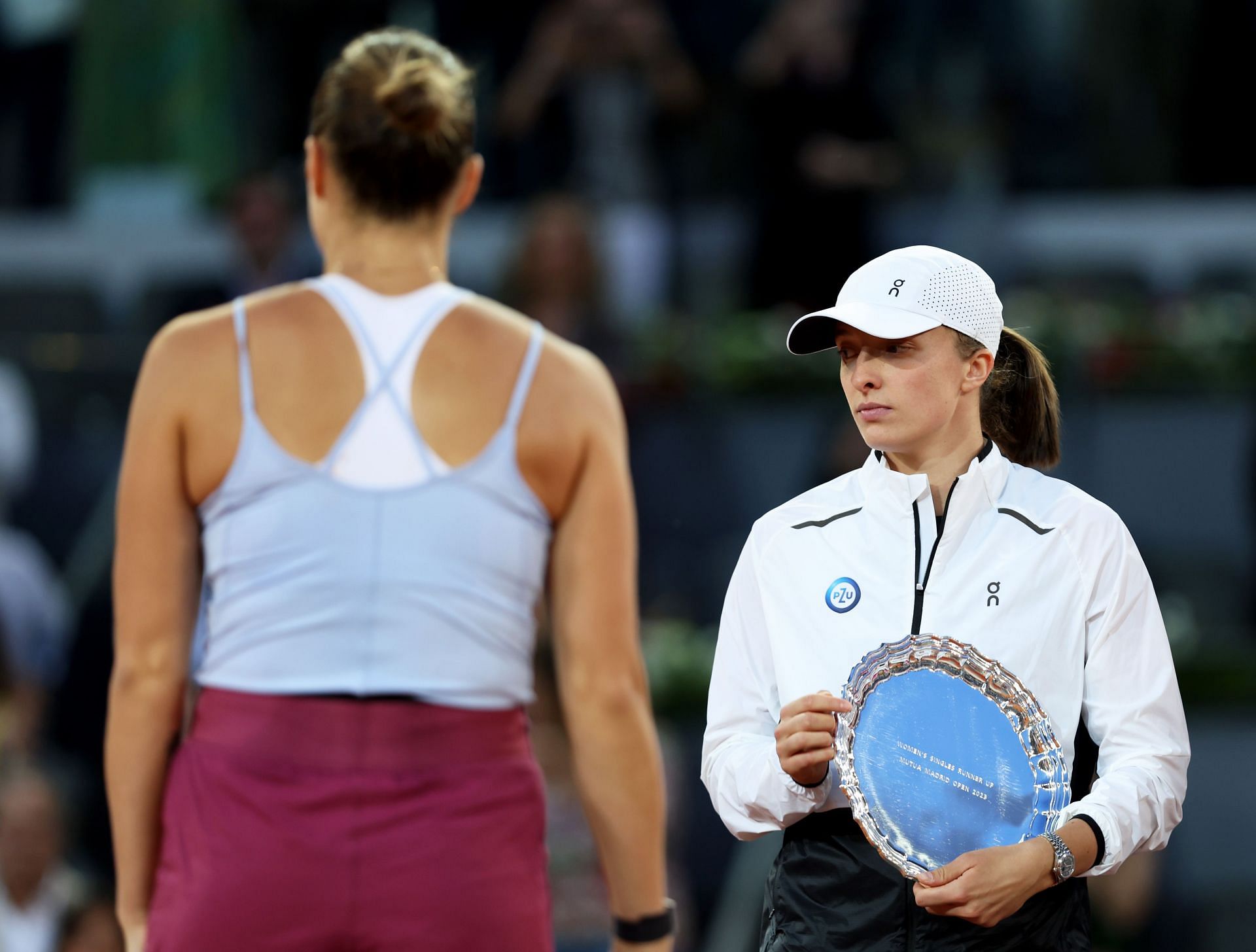 Iga Swiatek and Aryna Sabalenka during the Madrid Open women&#039;s singles final ceremony