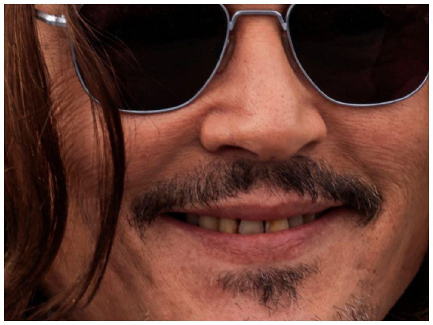 Johnny Depp (Image via IG @drcrow.dental)