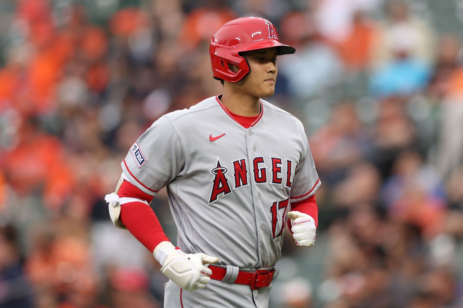 Shohei Ohtani of the Los Angeles Angels reacts after batting against the Baltimore Orioles at Oriole Park at Camden Yards