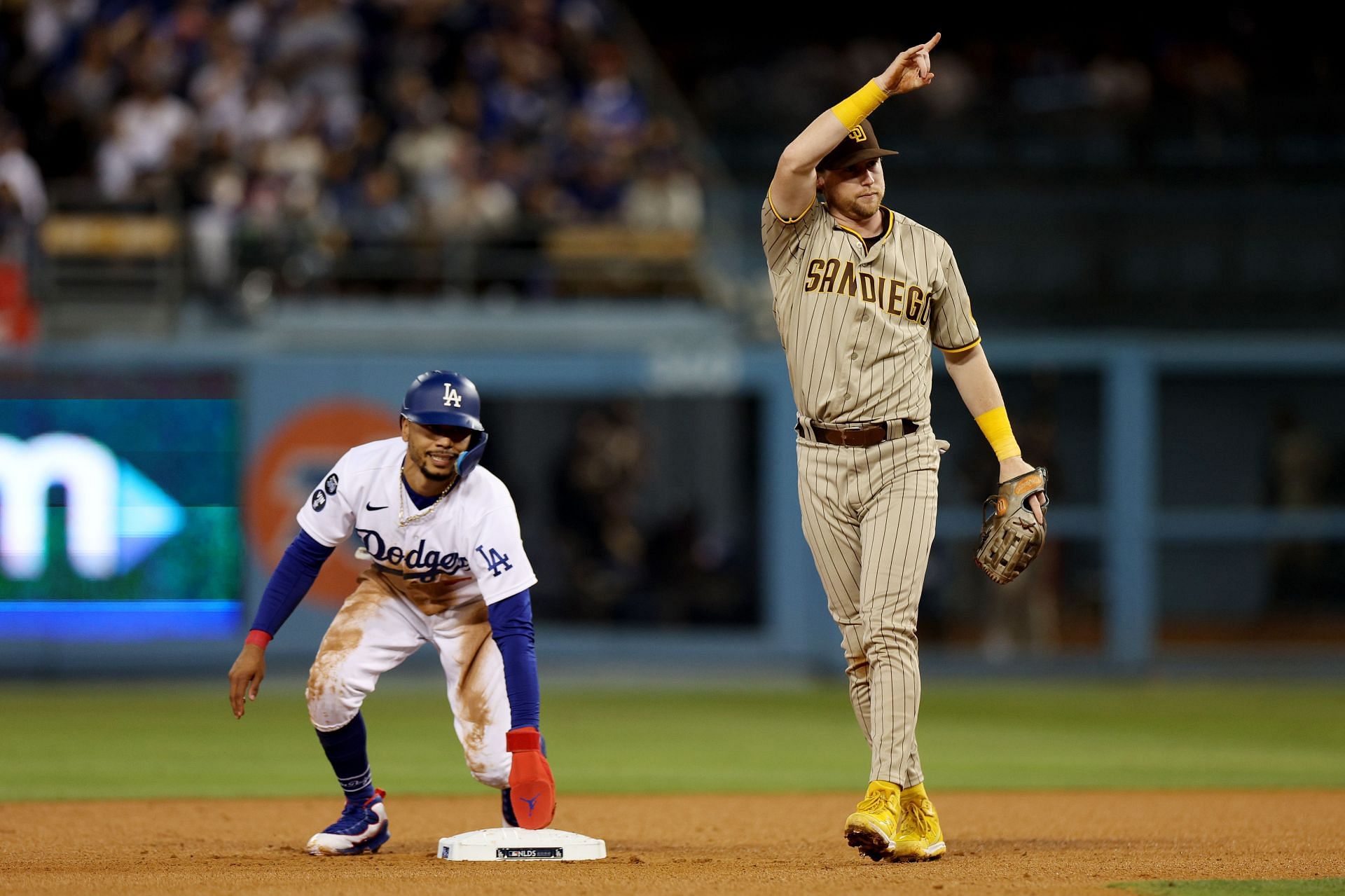 Mookie Betts is caught stealing second base by Jake Cronenworth of the San Diego Padres at Dodger Stadium