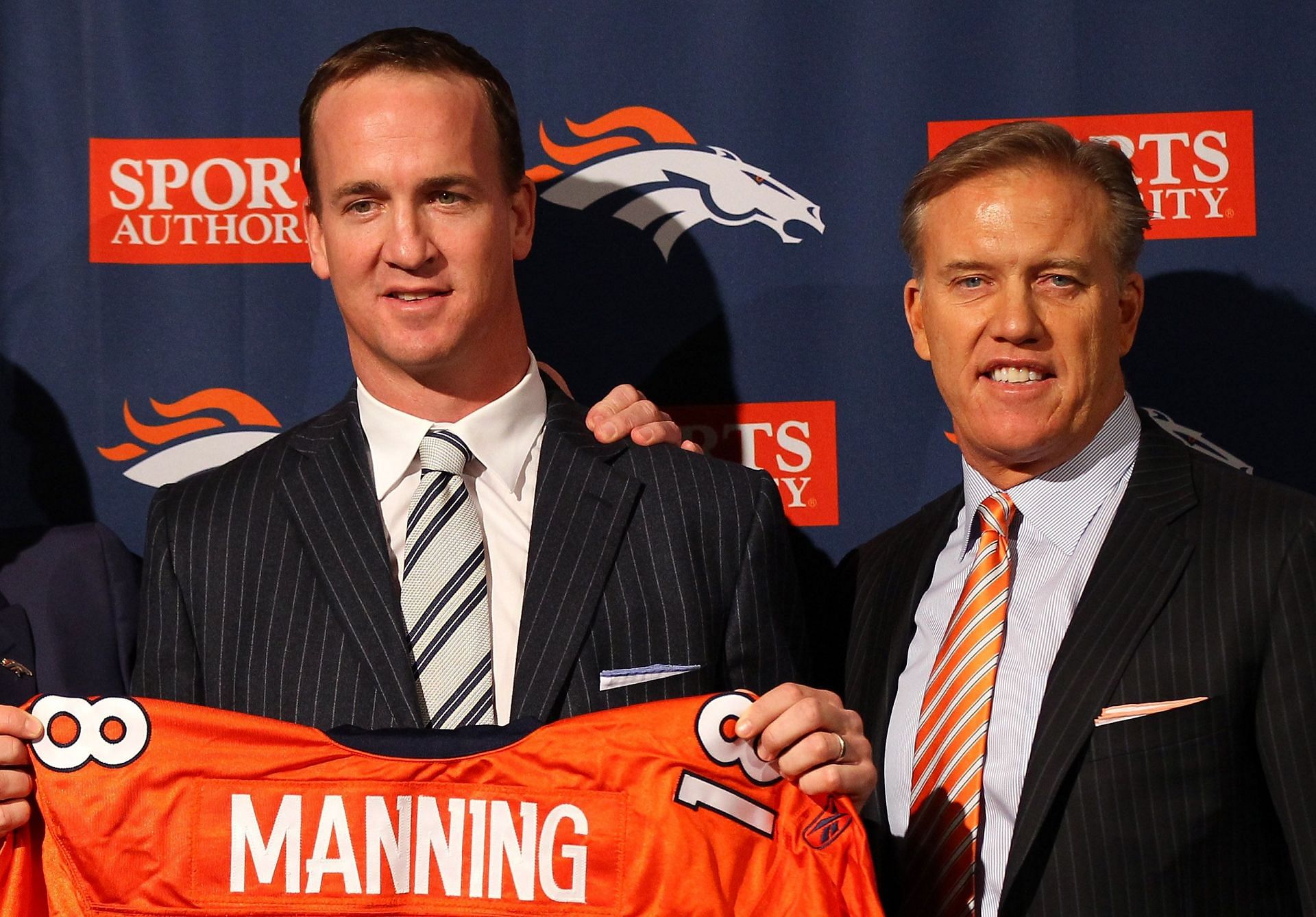 Peyton Manning and John Elway