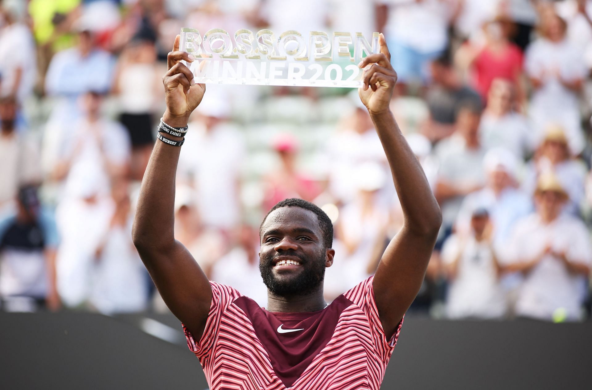 Frances Tiafoe with the 2023 BOSS Open title