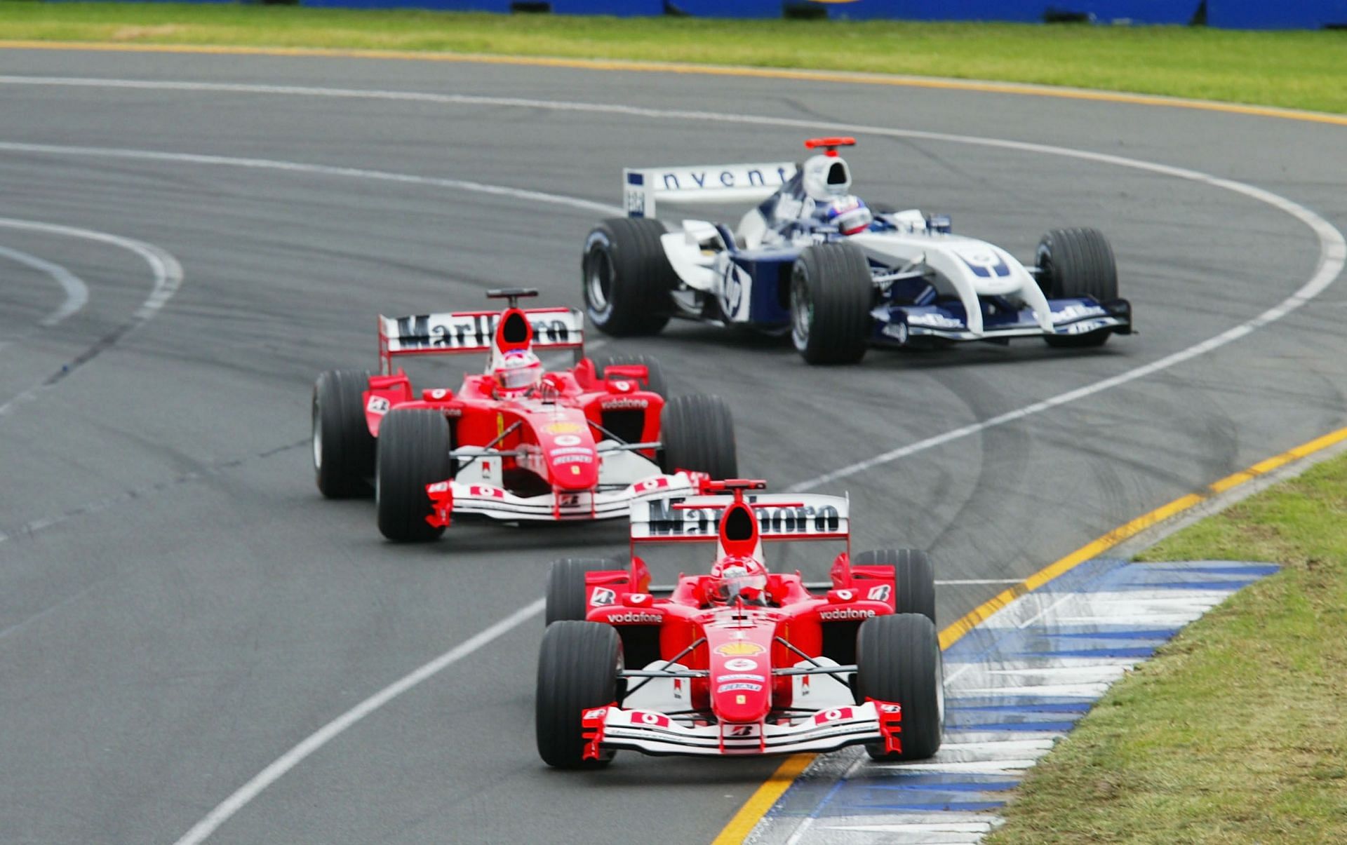 Michael Schumacher leading the Ferrari F2004 (V10) in 2004 (Photo by Mark Thompson/Getty Images)