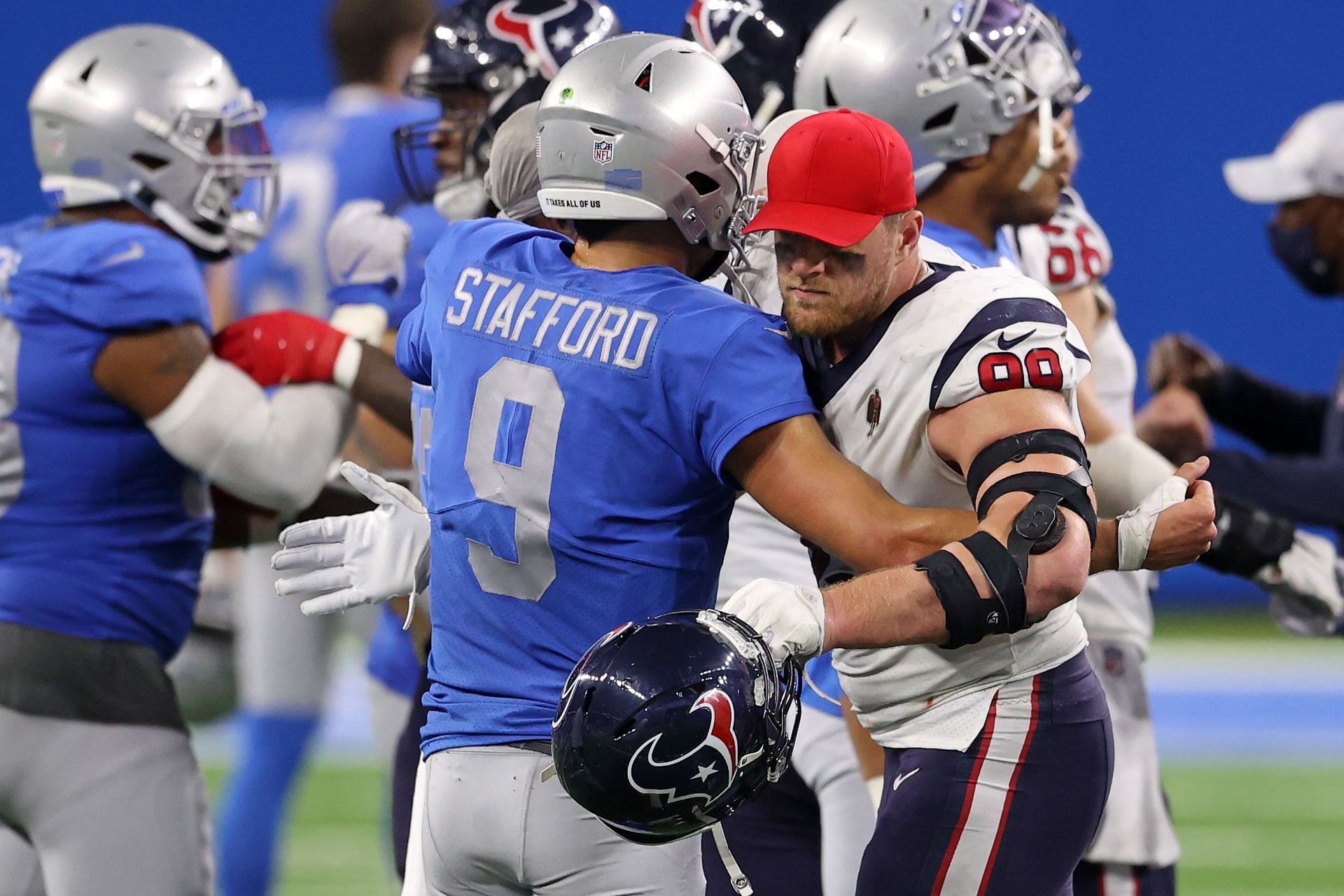 Watt hugging Detroit Lions QB Matthew Stafford