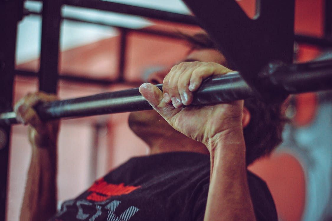 Assisted pull-up machines play a crucial role as a valuable tool in the process of mastering pull-ups. (Victor Freitas/ Pexels)