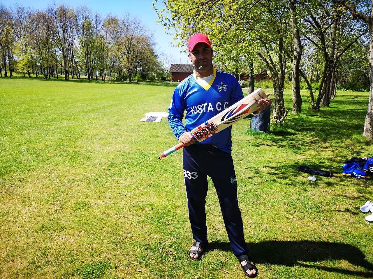 Marsta cricketer Waqas Haider poses for a photo