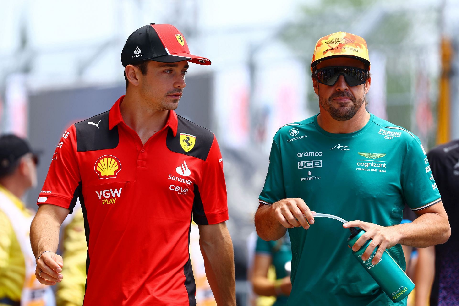 Charles Leclerc talks with Fernando Alonso, 2023 F1 Spanish GP (Photo by Adam Pretty/Getty Images)