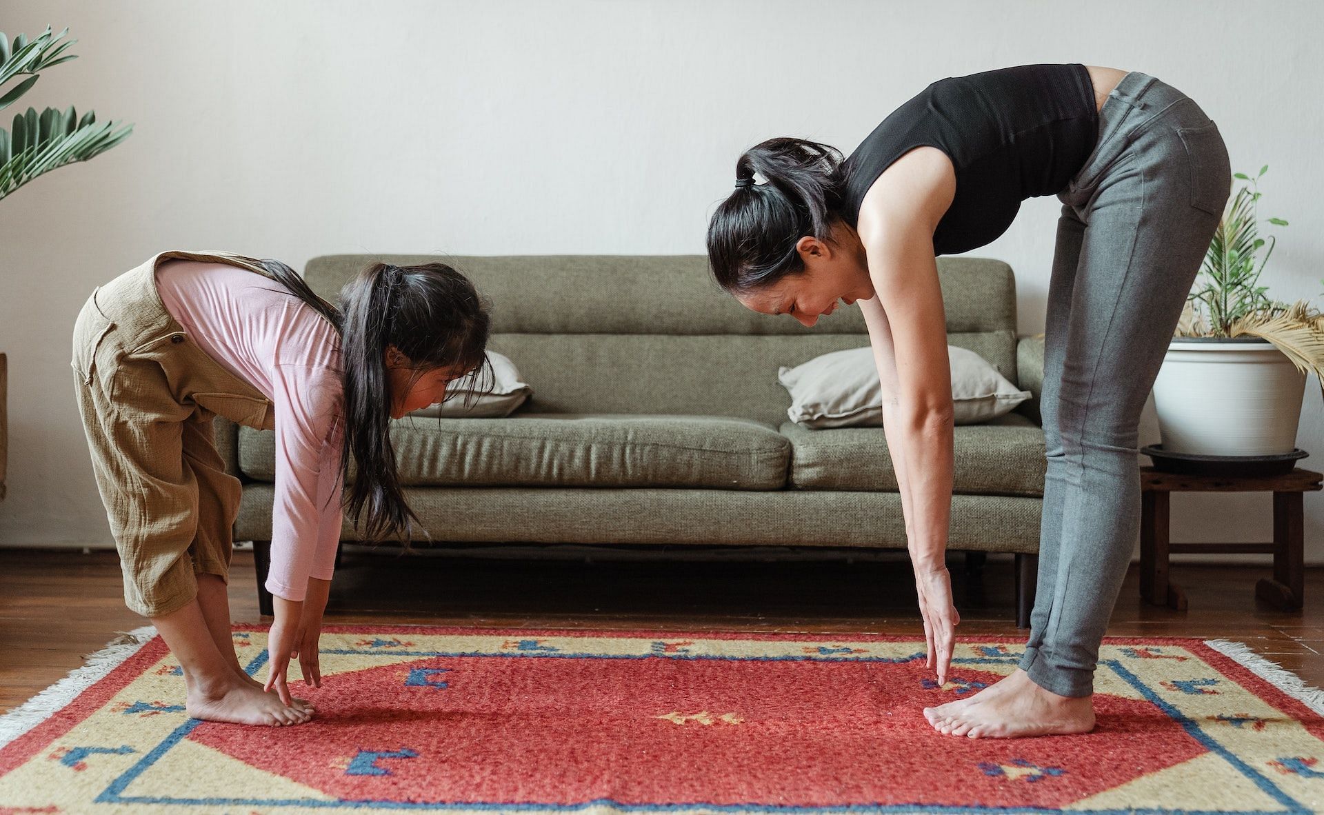 Acro yoga helps build balance and focus. (Photo via Pexels/Ketut Subiyanto)