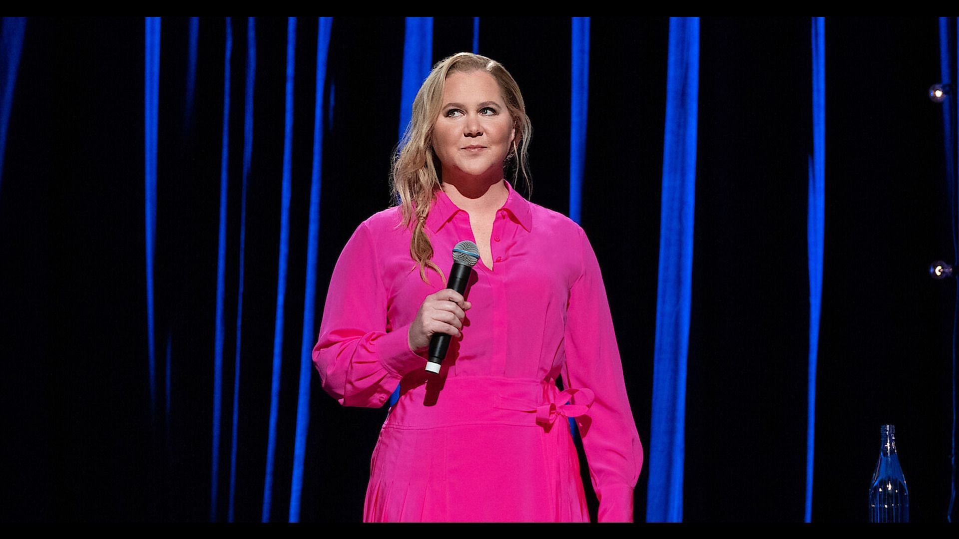 Amy Schumer at a Netflix stand-up special. (Image via Netflix)