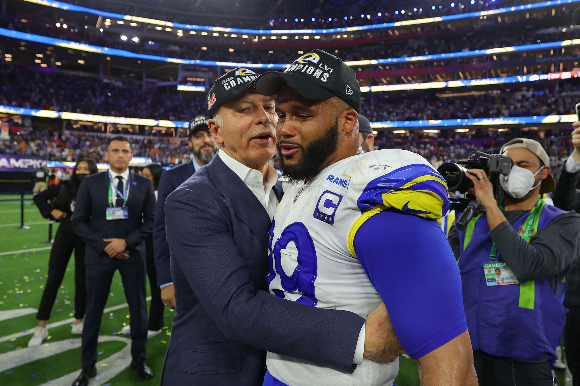 Stan Kroenke with Aaron Donald after a Super Bowl win