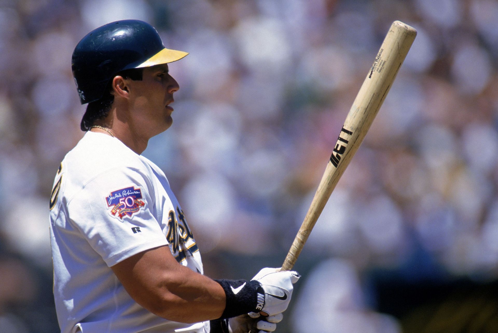 Rockies v Athletics: OAKLAND, CA - JUNE 14: Jose Canseco (33) of the Oakland Athletics stands ready at the plate against the Colorado Rockies during a game at Oakland-Alameda County Coliseum on June 14, 1997, in Oakland, California. The Rockies won 7-1. (Photo by Otto Greule Jr/Getty Images)