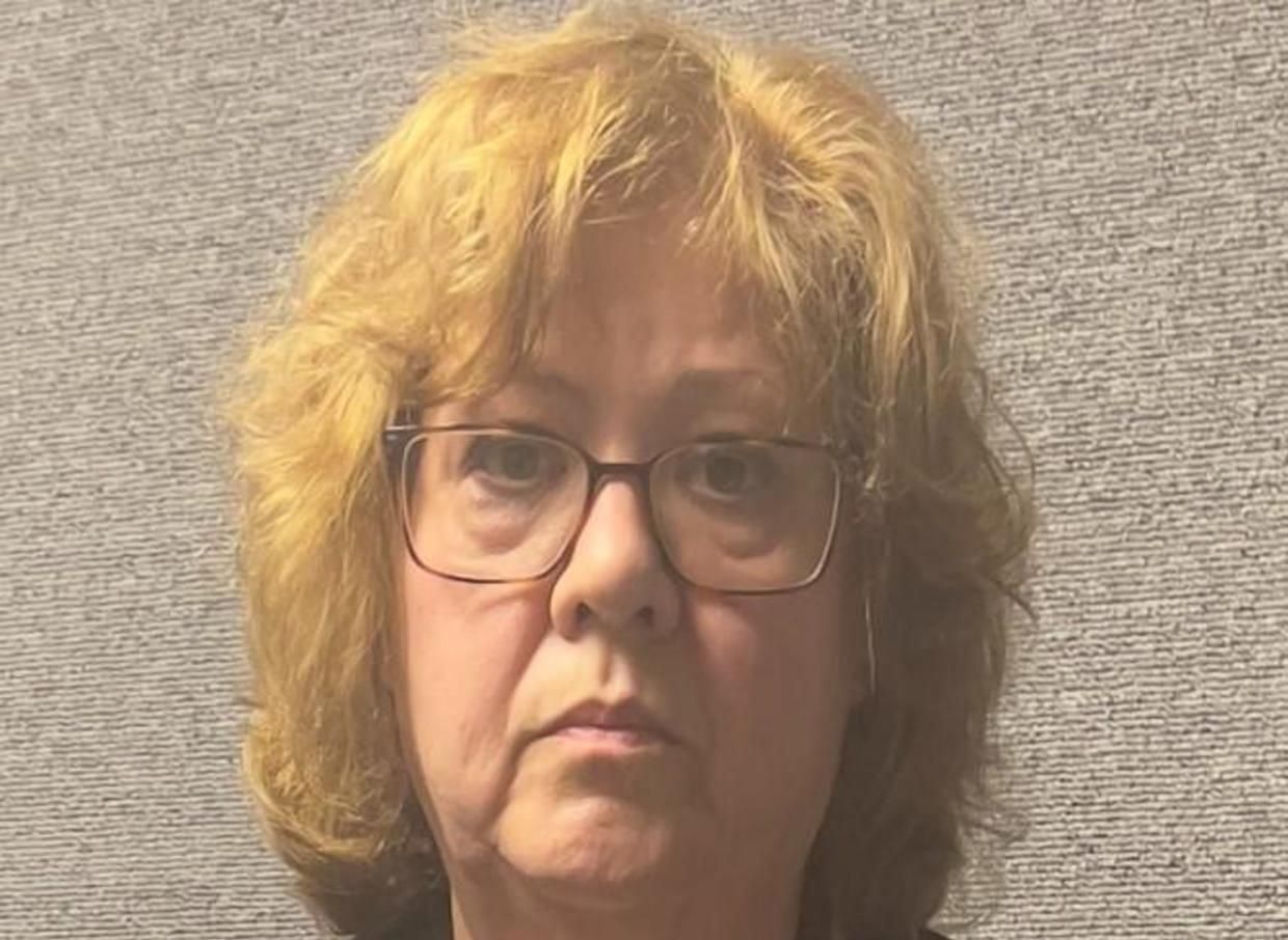 Social media users outraged as mugshot of Susan, the woman who killed Owens goes viral on the internet. (Image via Twitter)