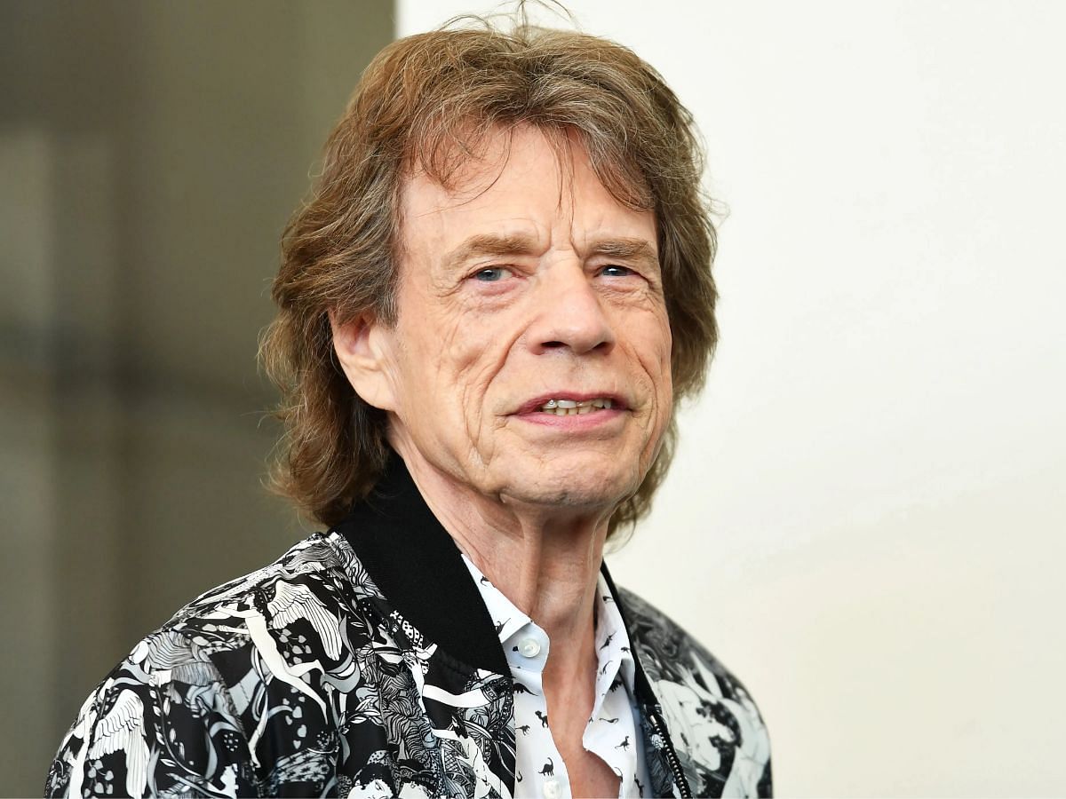Mick Jagger was knighted by the Queen Elizabeth II in December 2003 (Image via Getty)