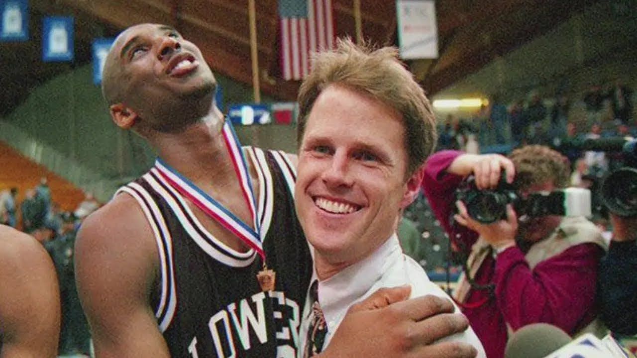 Kobe Bryant with his high school basketball coach Gregg Downer. (Photo: GAMETIME HIGHLIGHTS/YouTube)