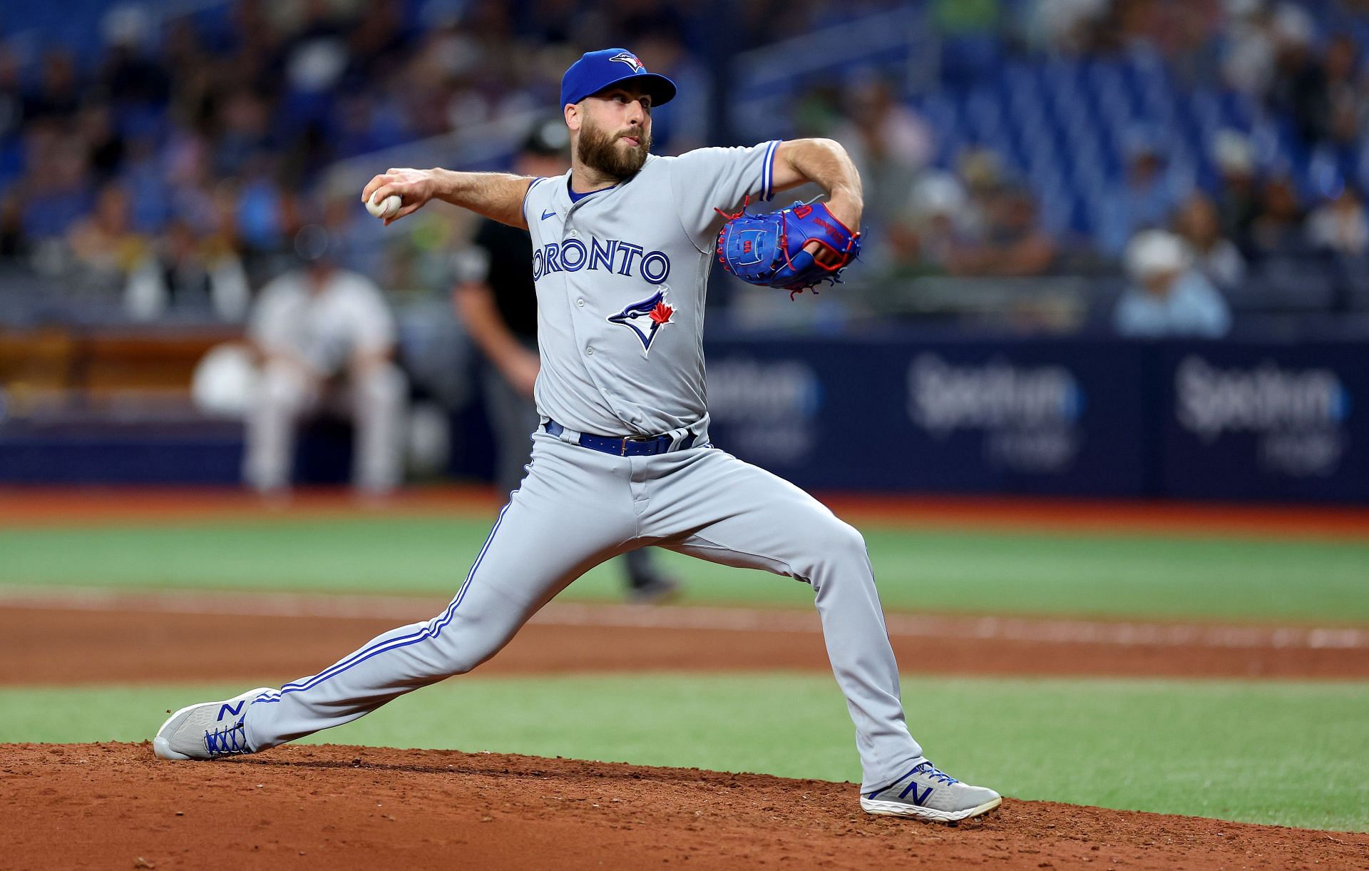Anthony Bass #52 of the Toronto Blue Jays pitches in the seventh inning during a game against the Tampa Bay Rays at Tropicana Field on May 22, 2023 in St Petersburg, Florida. (Photo by Mike Ehrmann/Getty Images)