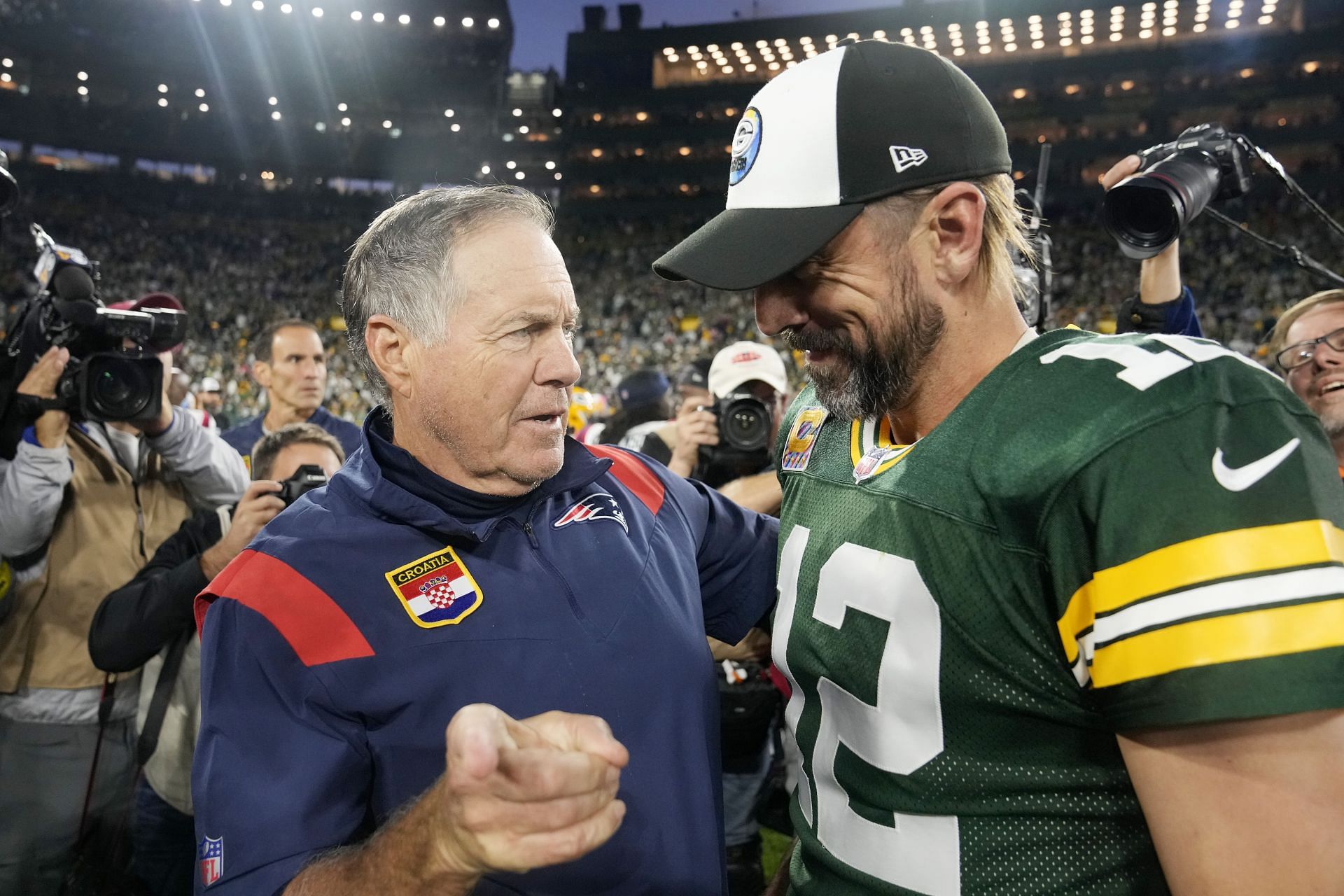Bill Belichick with Rodgers