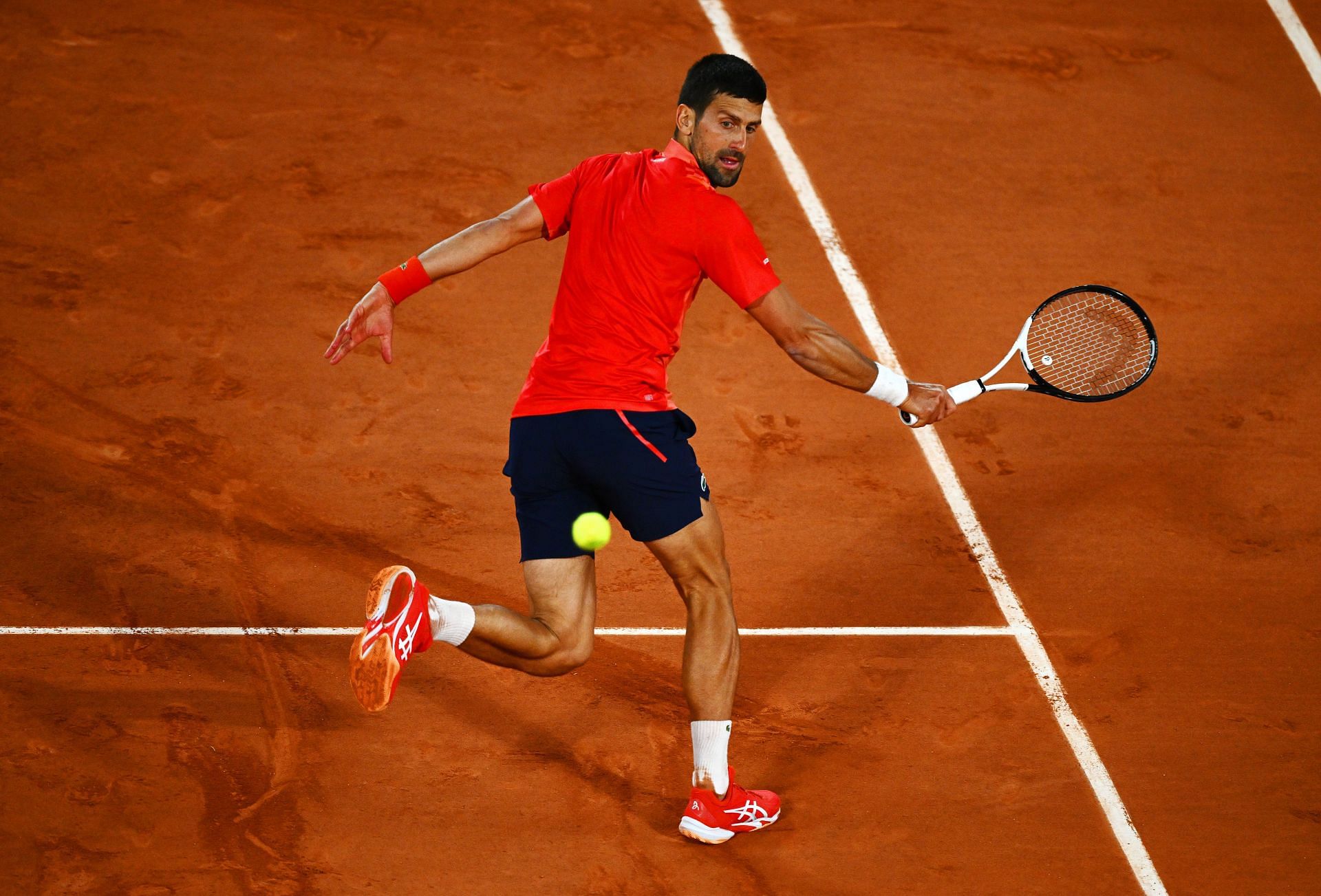 Novak Djokovic in action at the 2023 French Open.
