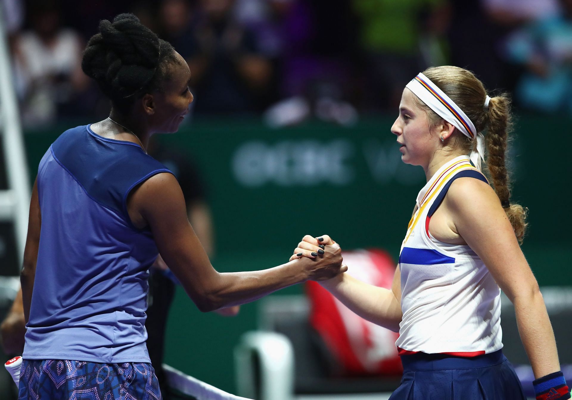 Venus Williams and Jelena Ostapenko at the 2017 WTA Finals in Singapore