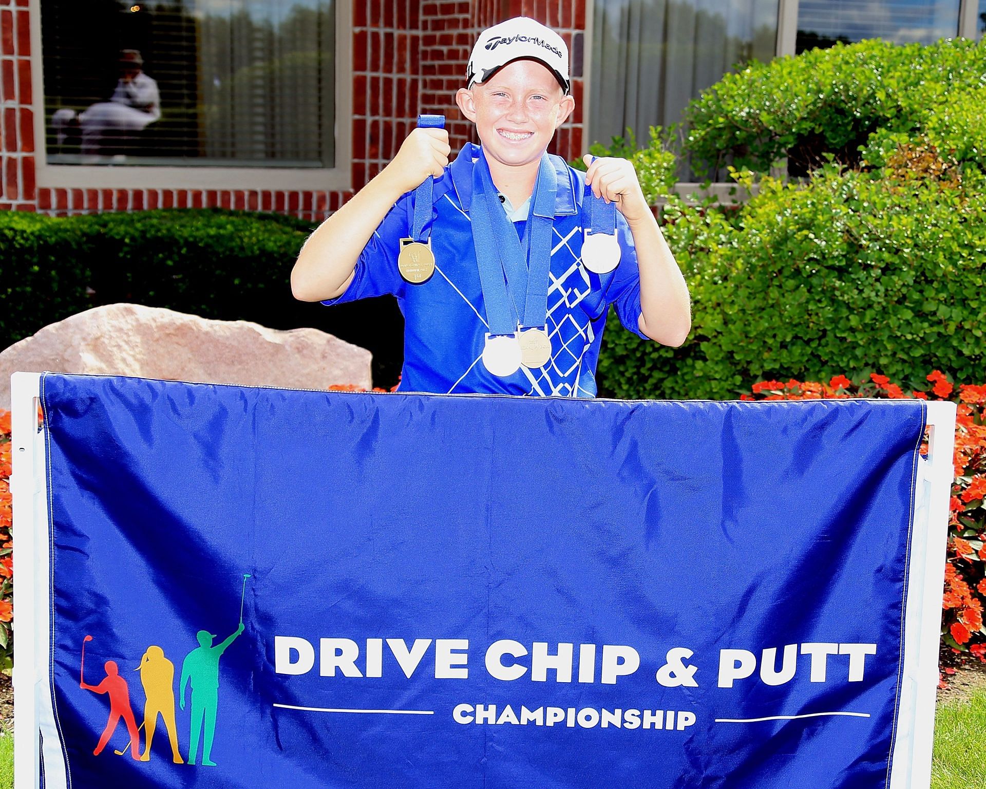 A 12-years-old Maxwell Moldovan won all three events at The Drive, Chip and Putt Championship, 2014 (Image via Getty).