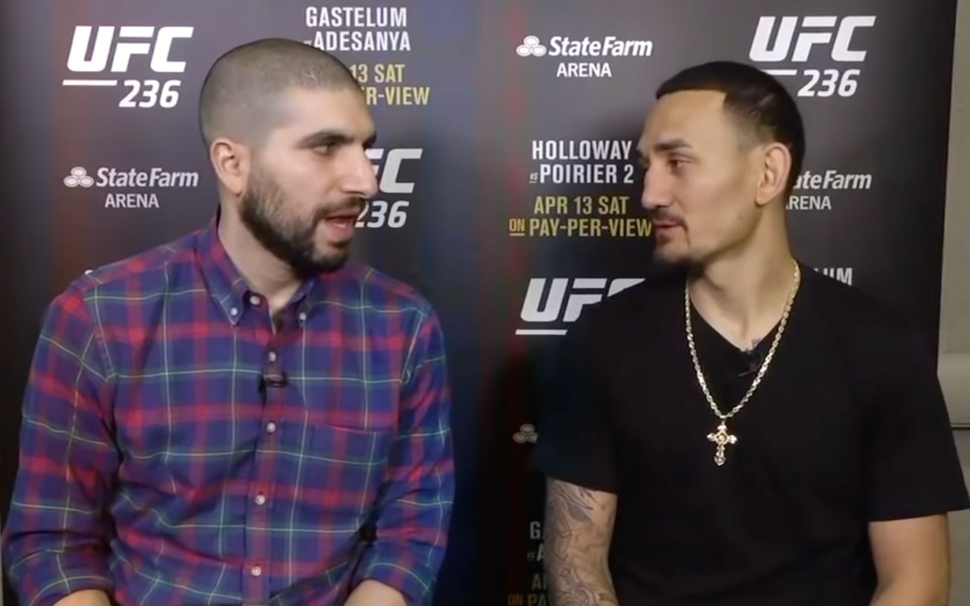 Ariel Helwani interviewing Max Holloway back at UFC 236 when Holloway went up to lightweight [Image courtesy: ESPN MMA (YouTube)]