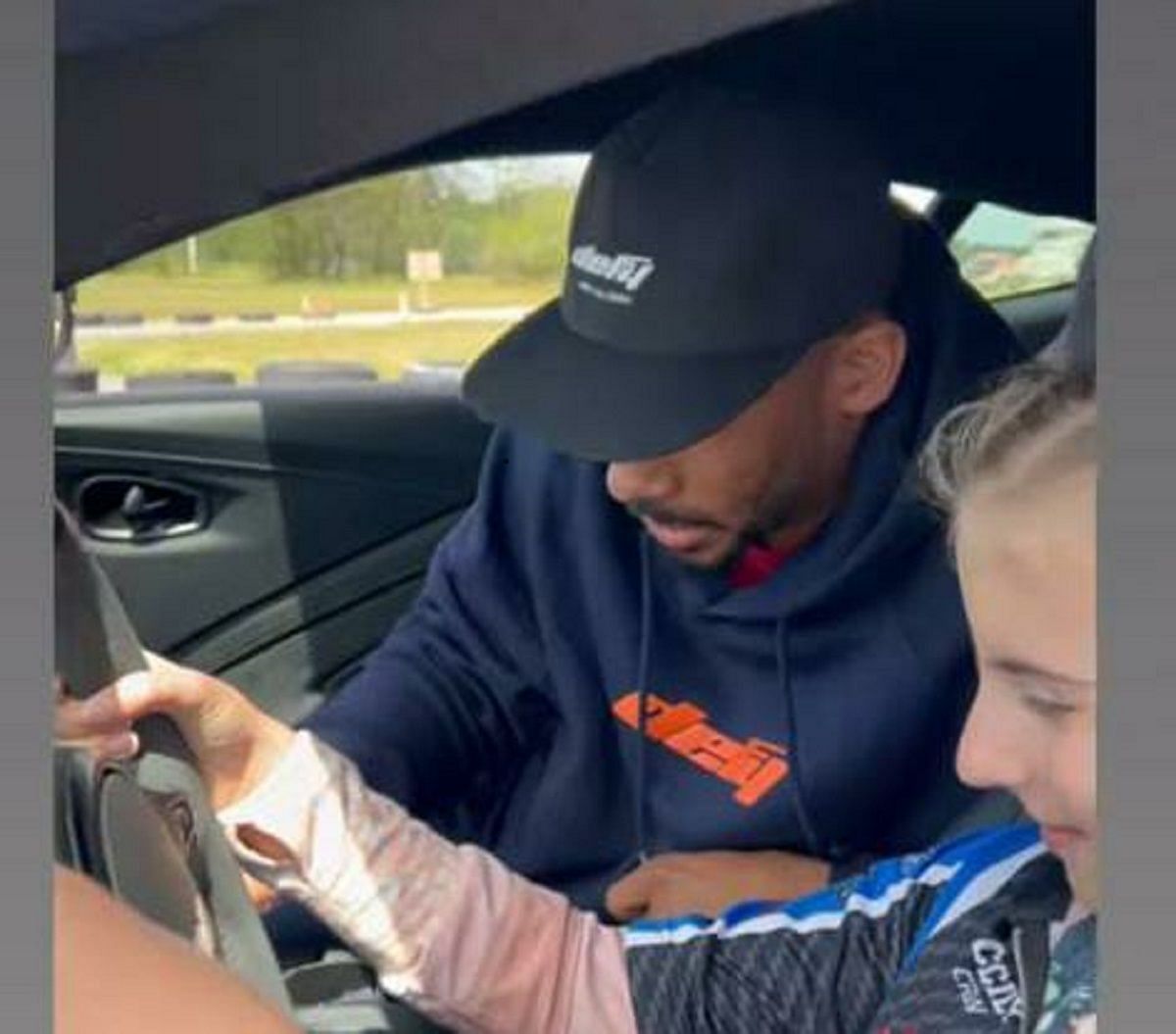 Kane teaches cancer patient Cecily Eklund how to drive 