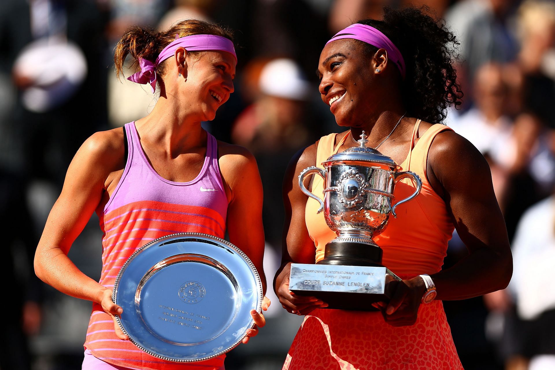 Serena Williams and Lucie Safarova with their respective trophies at the 2015 French Open