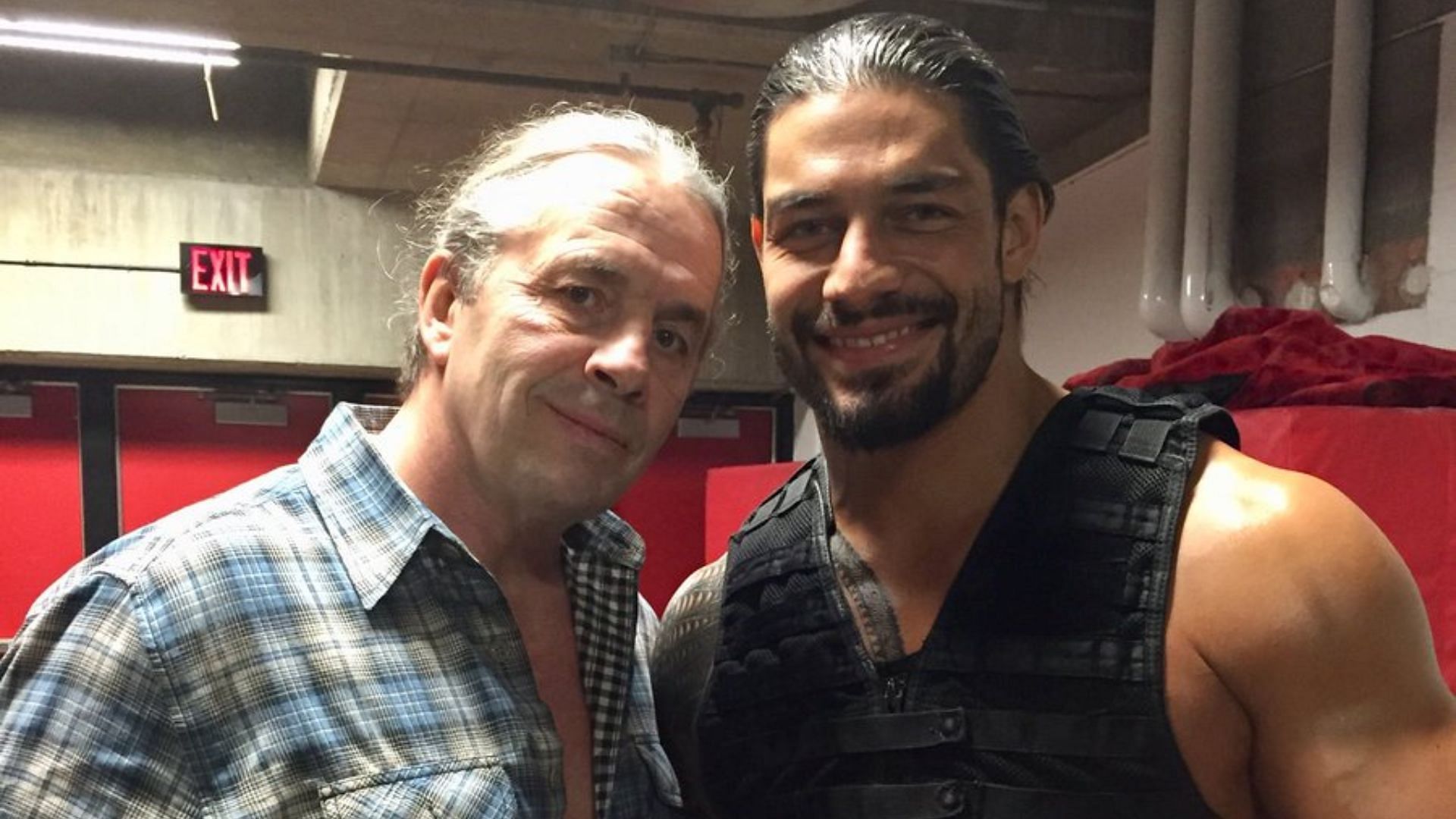 Bret Hart (left) and Roman Reigns (right)