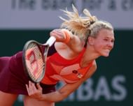 Katerina Siniakova serves at the 2023 French Open
