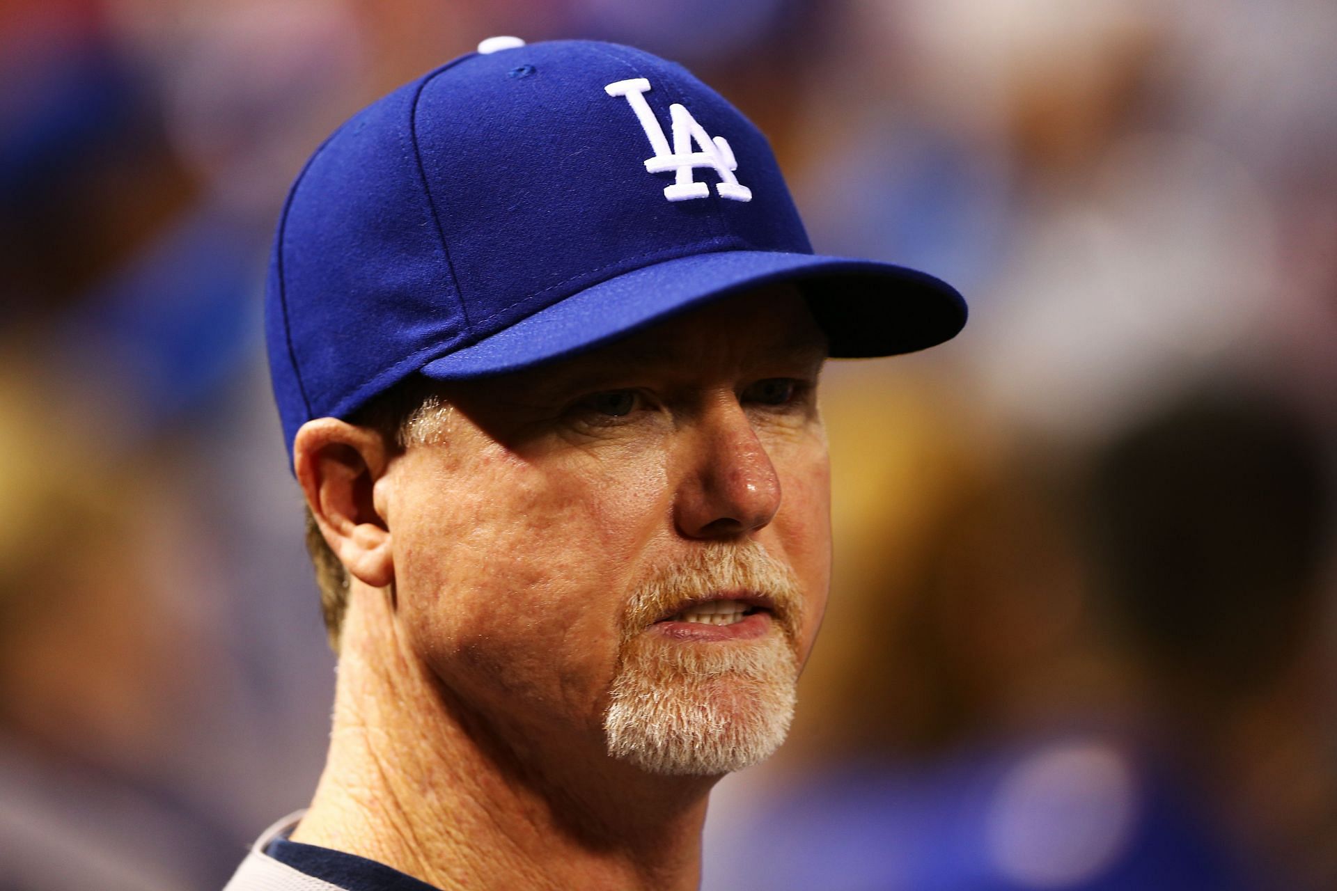 Batting coach Mark McGwire #12 of the Los Angeles Dodgers looks on prior to Game One of the National League Championship Series against the St. Louis Cardinals at Busch Stadium on October 11, 2013 in St Louis, Missouri. (Photo by Elsa Garrison/Getty Images)