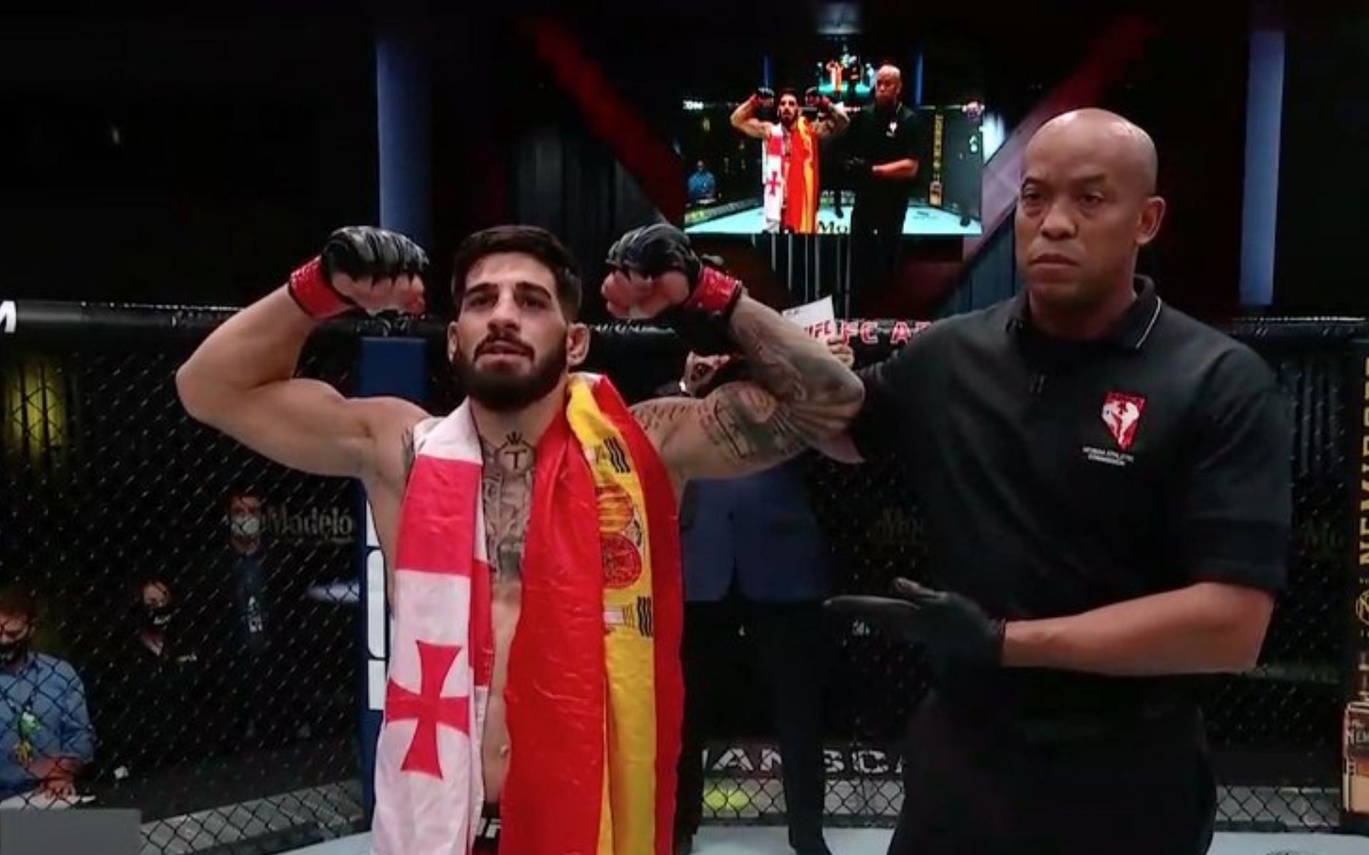 Ilia Topuria sporting a Georgian-Spanish flag [Image courtesy: @ATSteveDuncan on Twitter]