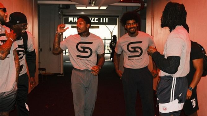 IN PHOTOS: Stefon Diggs' brother Darez pictured at football camp weeks after allegedly orchestrating elevator attack