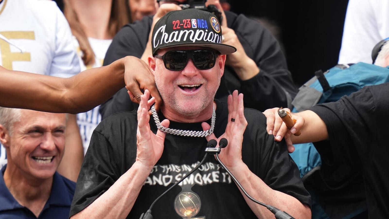 Denver Nuggets coach Michael Malone enjoying the Nuggets' championship parade on Thursday