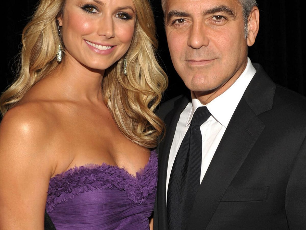 George Clooney and Stacy Keibler at a function
