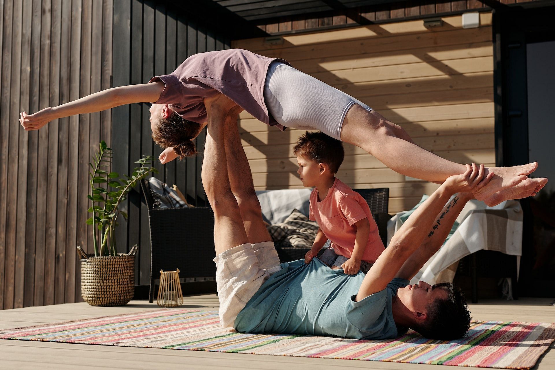 Young couple doing acrobatic pair yoga – Jacob Lund Photography Store-  premium stock photo
